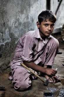 Child labour, surgical instruments production. Jharian Wala, Sialkot District, Punjab. Pakistan, 2013