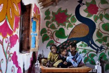 Children in a shelter decorated by Umro. Sindh, Paskistan, 2013.