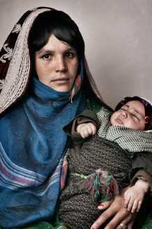 IDPs (internally displaced persons) mother and son at a camp in Herat Province, Afghanistan, 2012.