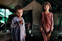 Jalozai IDP camp. IDPs come from war in the Federally Administered Tribal Areas. Maryam in her tent. Nowshera, KP, Pakistan, 2013