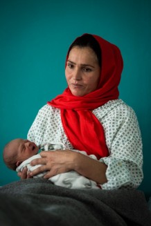 EMERGENCY's Maternity Centre, observation room, 2019. Nazia, 25 years old, with her fourth child. Nazia has two sons and two daughters. She lives with her husband, a policeman, at her in-laws’ house, in the Parwan province.