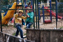 Children playing in Tebenneh, stronghold of Sunni Muslims. Destruction and poverty are consequences of recurring fightings with Alawites of Jabal Mohsen or with the Libanese army. Tripoli, Lebanon, 2014