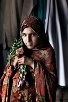 Interest Group, Naheed, 12 years old, daughter of a beneficiary. She doesn't go to school for there is no secondary school in her village. Beneficiaries bring their products to the President, so her husband sells them to the market. Cesvi's project financed by Italian Development Cooperation. Malang Bargh, Nowshera District, KP. Pakistan, 2013
