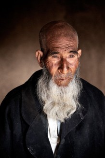 The camps of returning refugees or internally displaced populations become very quickly breeding grounds of sorrow. Diseases take hold faster in these impoverished, small temporary quarters, rife with violence, unemployment and children forced to labour and early marriage. This old man is sick with TB.<br>Maslakh, IDP camp. Province of Herat, 2012