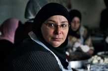 Cooks preparing lunch for the most vulnerable. The ICRC's kitchen project in Tebenneh produces 280 meals every day. Tripoli, Lebanon, 2014