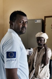 Lab technician Abdulgader Abdullah, 34 years old, taking a blood sample from Adam Musa, 45 years old. The lab equipment and furniture were provided by PQHS. Telkook hospital, Kassala State. Sudan 2015