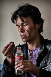 Here we have the modern, cool, young Afghan, taking his medication with an American soft drink. Regardless of the challenges Afghans face, they remain hopeful and are moving forward to improve their lives. By listening to Afghan voices and engagement by the community we are able to develop sustainable solutions for all Afghans. So we all have to listen to our Afghans as they call out: "Stop TB, now and forever!"<br>TB Centre, the treatment. Herat, 2012