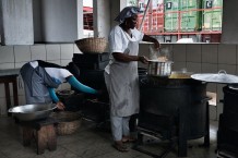 Surgical and Paediatric Centre, kitchen. The cooks prepare all the meals for patients, hospitalized children’s mothers and the staff. In the background some of the hospital containers. Goderich, Freetown, Sierra Leone 2017