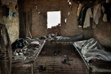 Brick kiln workers sleeping in the kiln, Sialkot District, Punjab. Pakistan, 2013
