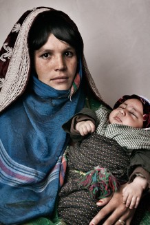Mother and son, IDPs, beneficiaries of GVC's project of rural development and animal husbandry in Pashtun Zargun Disctrict financed by UNHCR. Province of Herat, Afghanistan, 2012