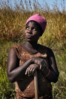 Training on rice production: tilling the paddy field. Jessy Kumalila, 25 years old, farmer. The training is part of a project of food security and resilience of Italian NGO CISP (International Committee for the Development of Peoples) funded by European Union. Nkhotakota District, Malawi, 2018.