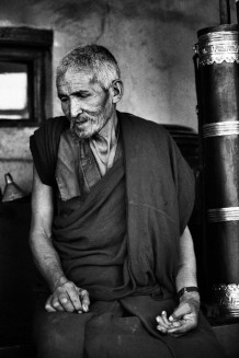 A Lama, Thiksey Gompa. Ladakh, India, 1990.<br>Thiksey Gompa (monastery) gives hospitality to a community of 108 monks, admitted from the age of 4 years.