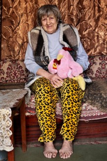 Halyna, 67, beneficiary. Halyna has been a widow for many years and lives with four grandchildren. The children are nervous and scared; one has a cognitive disability and is unable to speak. He is the only one who goes to school once or twice a week: volunteers provide services for children with special needs. Sadove, Kharkiv Region. Ukraine, 2026