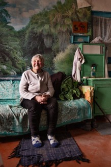 Zinaida, an 88-year-old beneficiary, during a home visit. She lives alone with her cat. She suffers greatly from loneliness. She has two daughters whom she sees very rarely. Next weekend, after three years, one of them is supposed to come visit her, but Zinaida fears she won't come because the trains are being attacked by drones. Mechebylove, Kharkiv Region. Ukraine, 2026