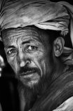 A merchant. Pul-i-Khumri, Afghanistan, 2003.