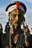 Peul Bororo (Wadabee) man, dressed and made up for a beauty competition. Beauty is a great value for Peul Bororos. Aïr Festival, sustained by a CISP’s project. Iférouane, Niger 2018